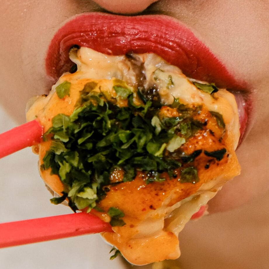 Dimsum on red chopstick